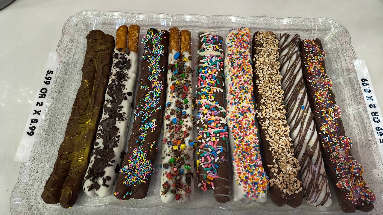Hand-dipped chocolate pretzel rods made in-store at Island Candy